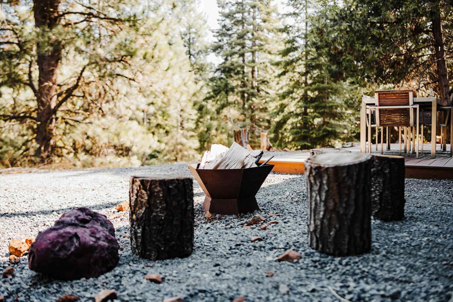 Outdoor fire pit with Adirondack chairs